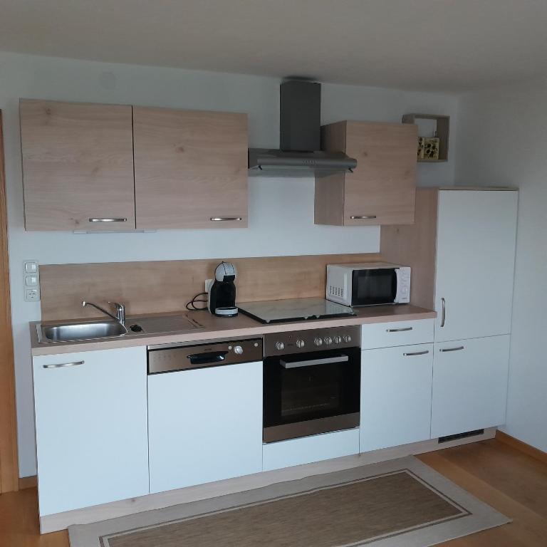 Kuchyň nebo kuchyňský kout v ubytování Schröckhof