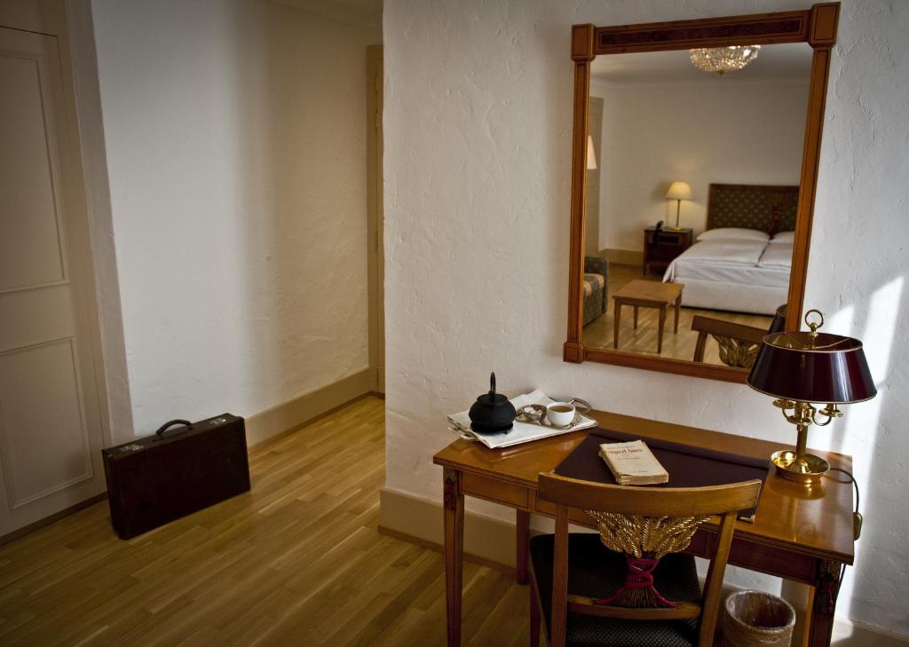 Postel nebo postele na pokoji v ubytování Auberge du Raisin