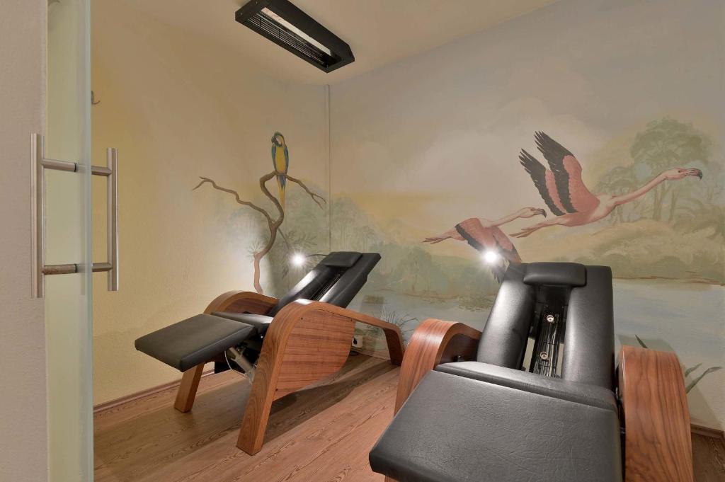 Fitness centrum a/nebo fitness zařízení v ubytování Hotel Glockenstuhl