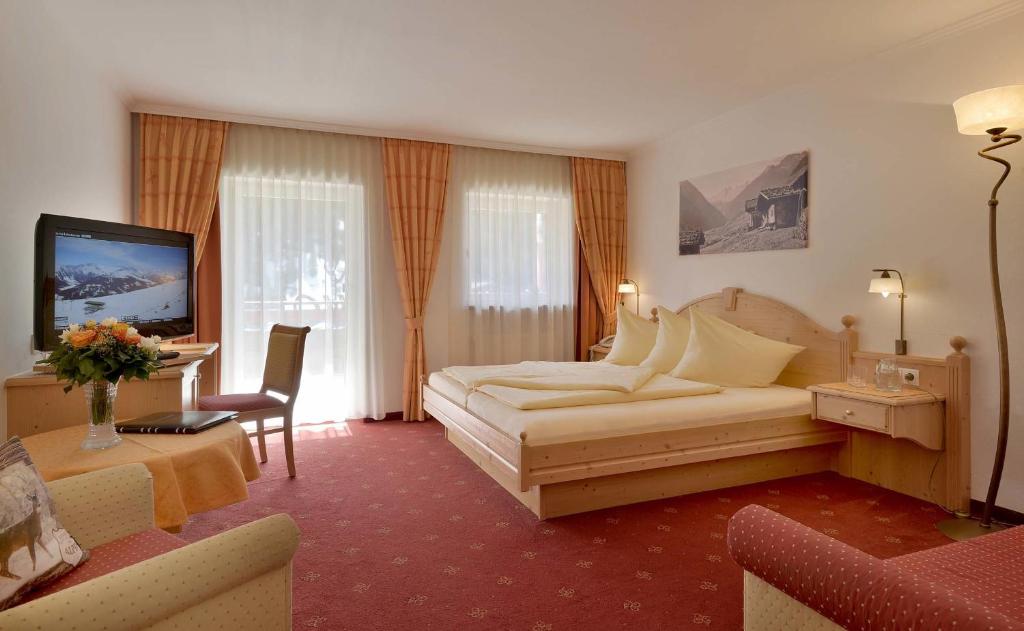 Postel nebo postele na pokoji v ubytování Hotel Glockenstuhl