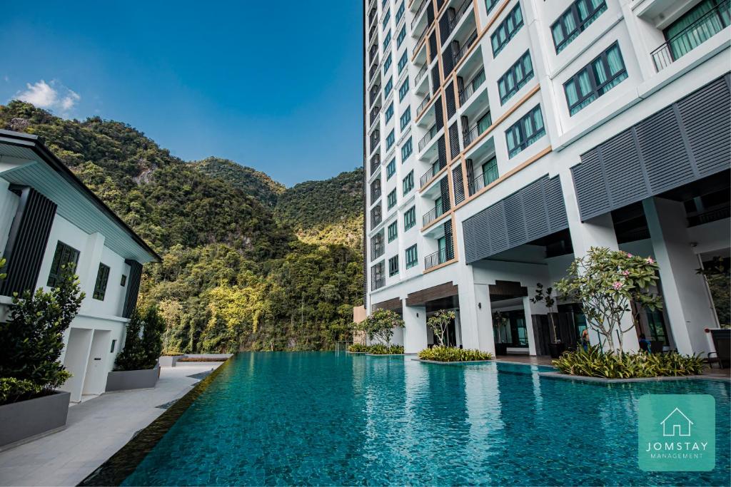 Bazén v ubytování JOMSTAY Sunway Onsen Suites Ipoh - Lost World of Tambun Ipoh Waterpark nebo v jeho okolí