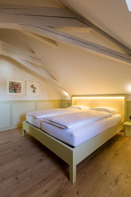 Postel nebo postele na pokoji v ubytování Hotel Krone Speicher