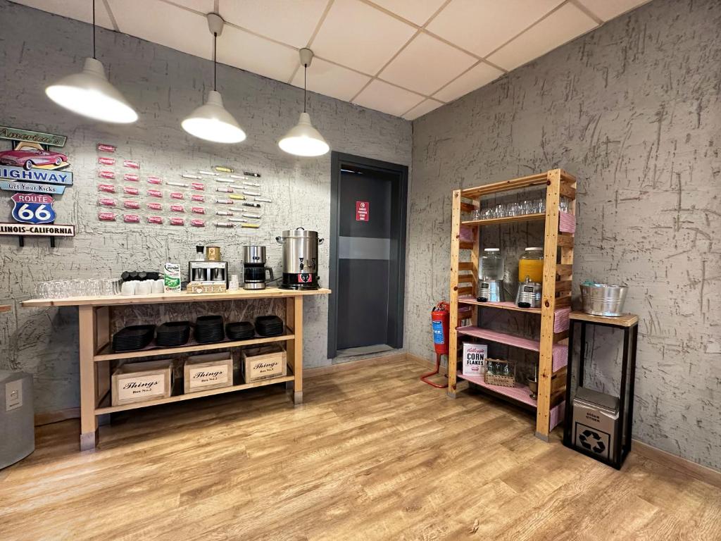 Kuchyň nebo kuchyňský kout v ubytování My Dora Hotel