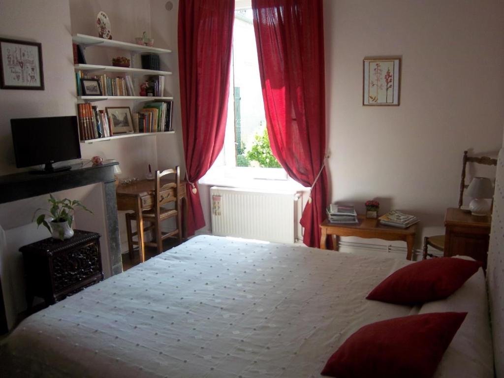 Postel nebo postele na pokoji v ubytování Le Relais De Marbot