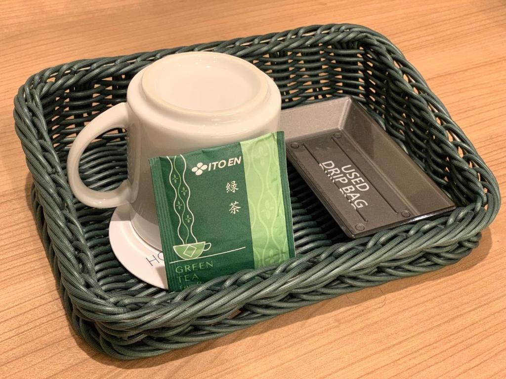 Příslušenství pro přípravu čaje a kávy v ubytování Hotel Kazusaya