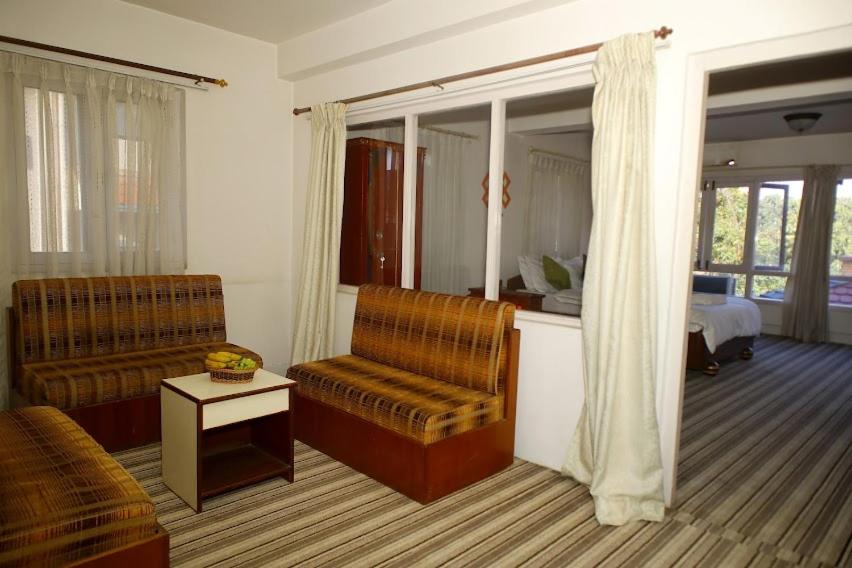 Posezení v ubytování Bouddha Green Hotel