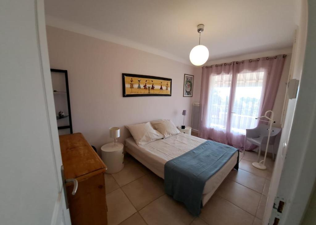Posteľ alebo postele v izbe v ubytovaní Belle villa piscine Provence Uzes climatisée