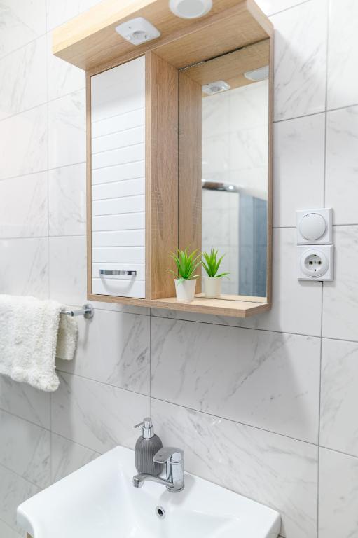 Koupelna v ubytování Apartmani ZAT