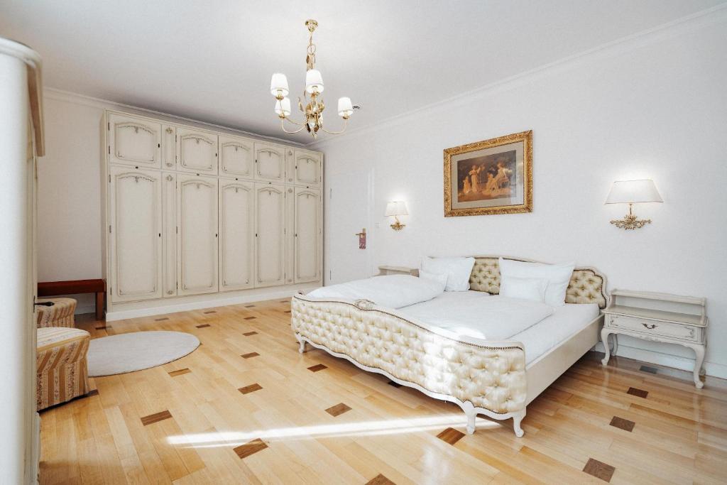 Postel nebo postele na pokoji v ubytování Hotel Fletzinger