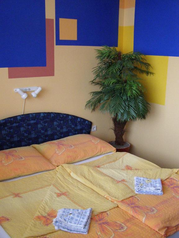 Postel nebo postele na pokoji v ubytování Hotel Morava