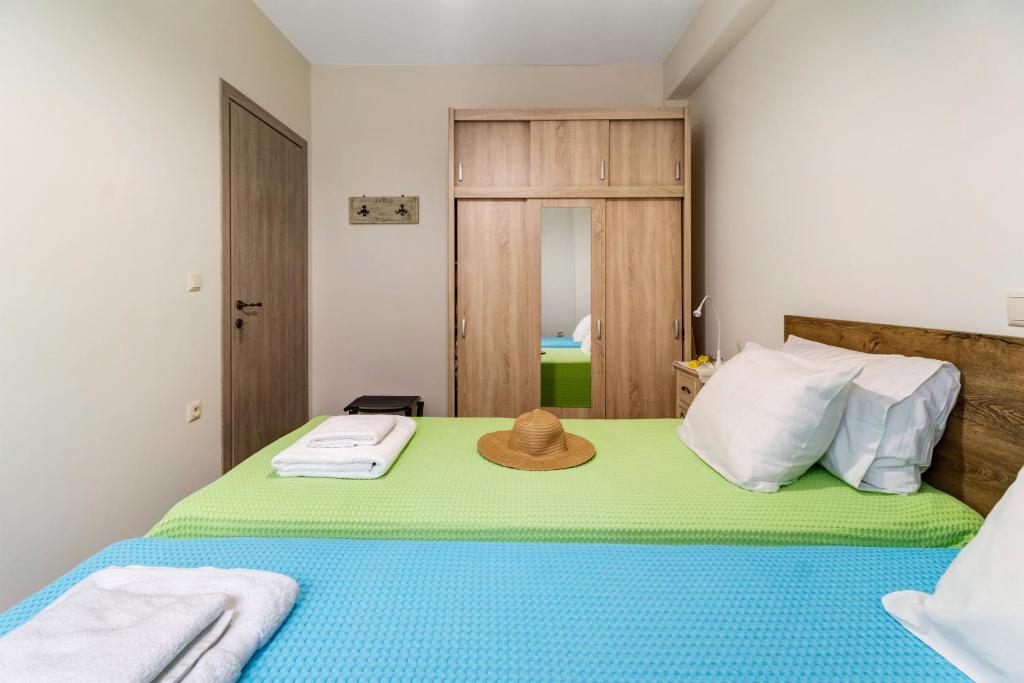 Posteľ alebo postele v izbe v ubytovaní Lefkada view villa Vasiliki 1