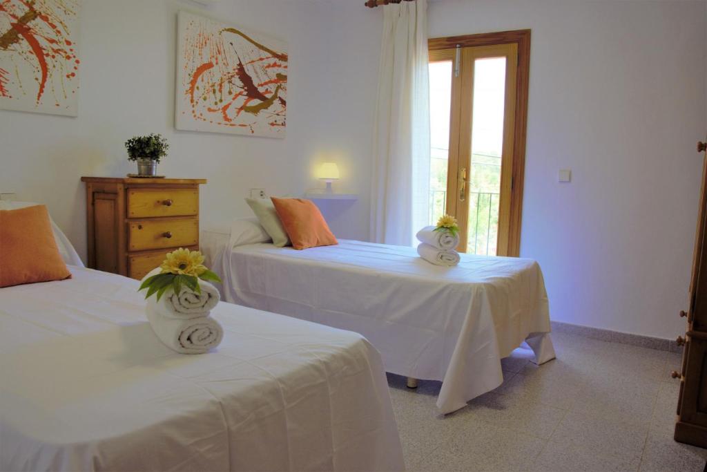 Postel nebo postele na pokoji v ubytování Ideal Property Mallorca - Madona - Es Puig