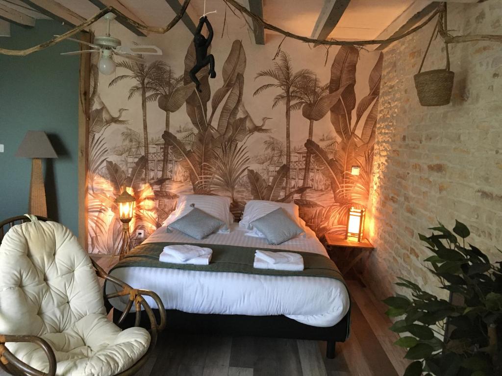 Postel nebo postele na pokoji v ubytování Au Domaine du Petit Cercoux