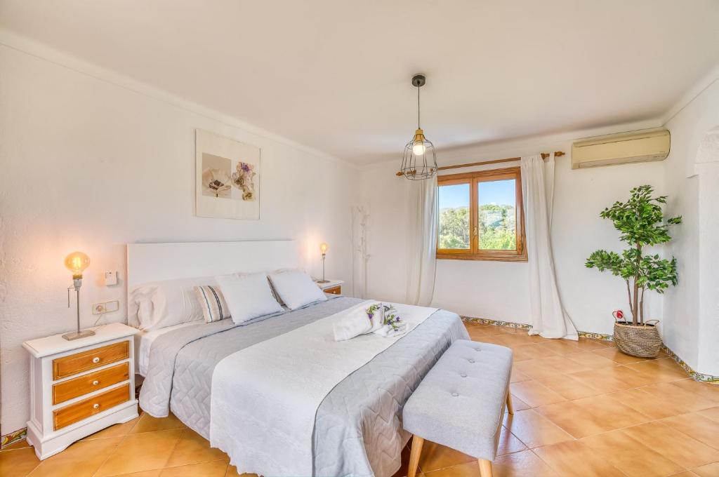 Posteľ alebo postele v izbe v ubytovaní Ideal Property Mallorca - Can Carabassot