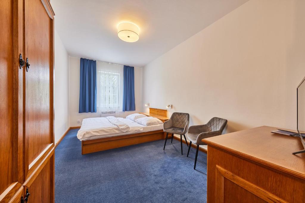 Postel nebo postele na pokoji v ubytování Hotel Auri