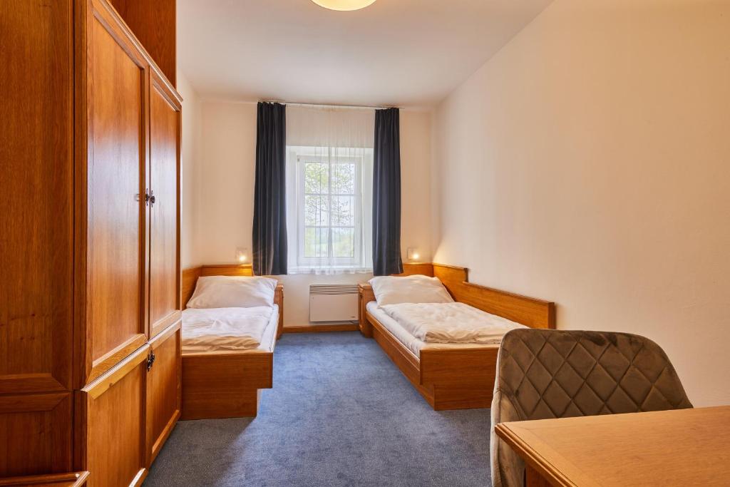 Postel nebo postele na pokoji v ubytování Hotel Auri