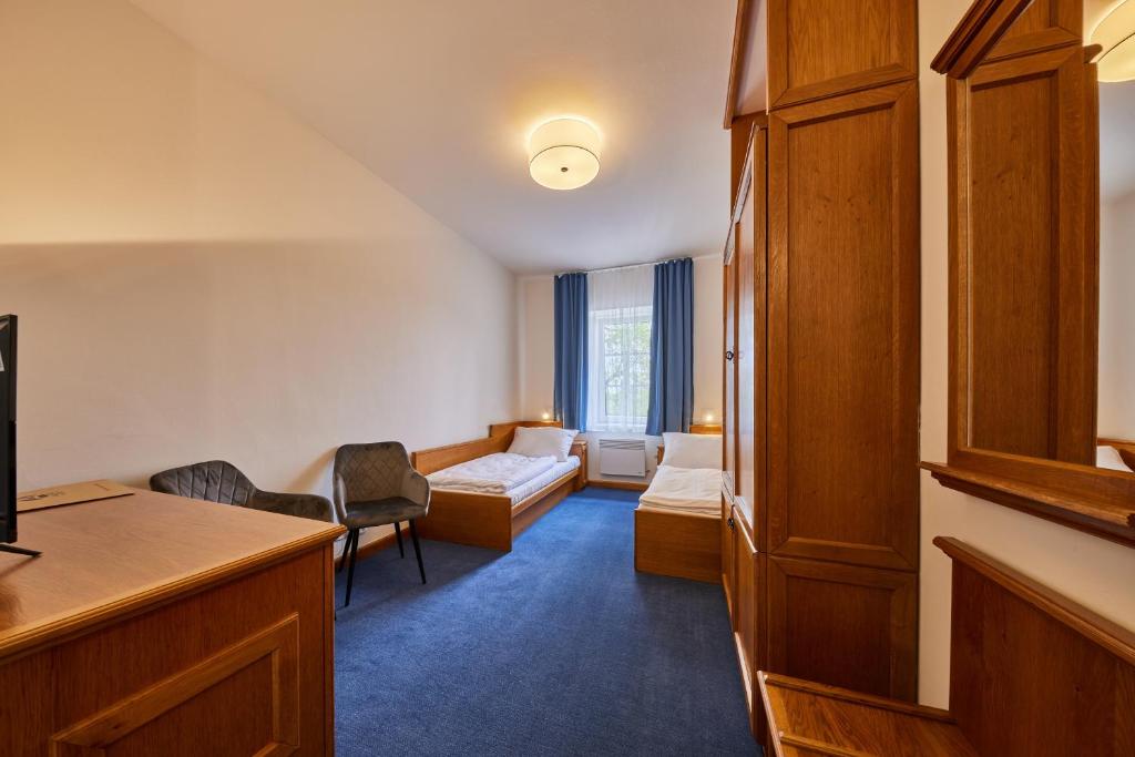 Postel nebo postele na pokoji v ubytování Hotel Auri