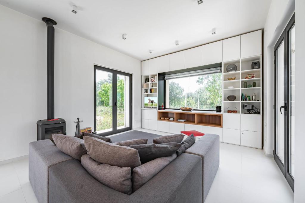 Χώρος καθιστικού στο Lamia del Lupo by Rentbeat