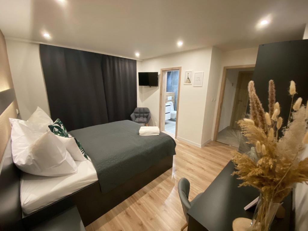 TV a/nebo společenská místnost v ubytování Vila LEMAR wellness & spa