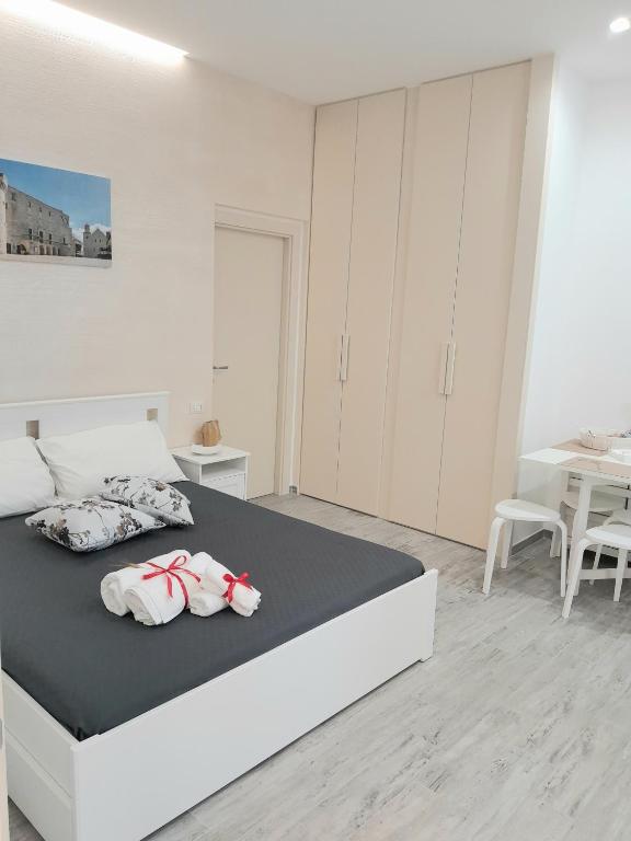 Postel nebo postele na pokoji v ubytování Dimora Pié del Castello