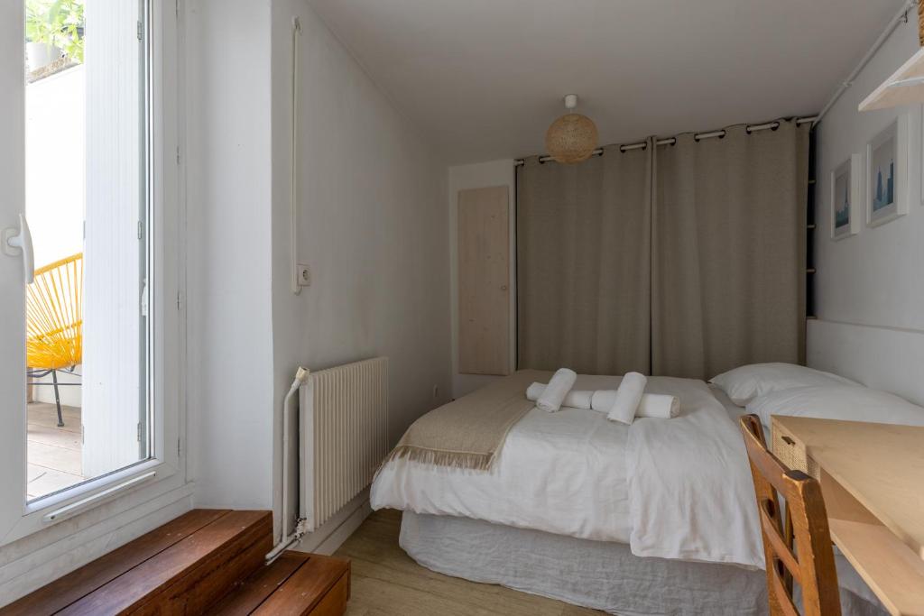 Posteľ alebo postele v izbe v ubytovaní 90m2 renové - terrasse en plein coeur de marseille