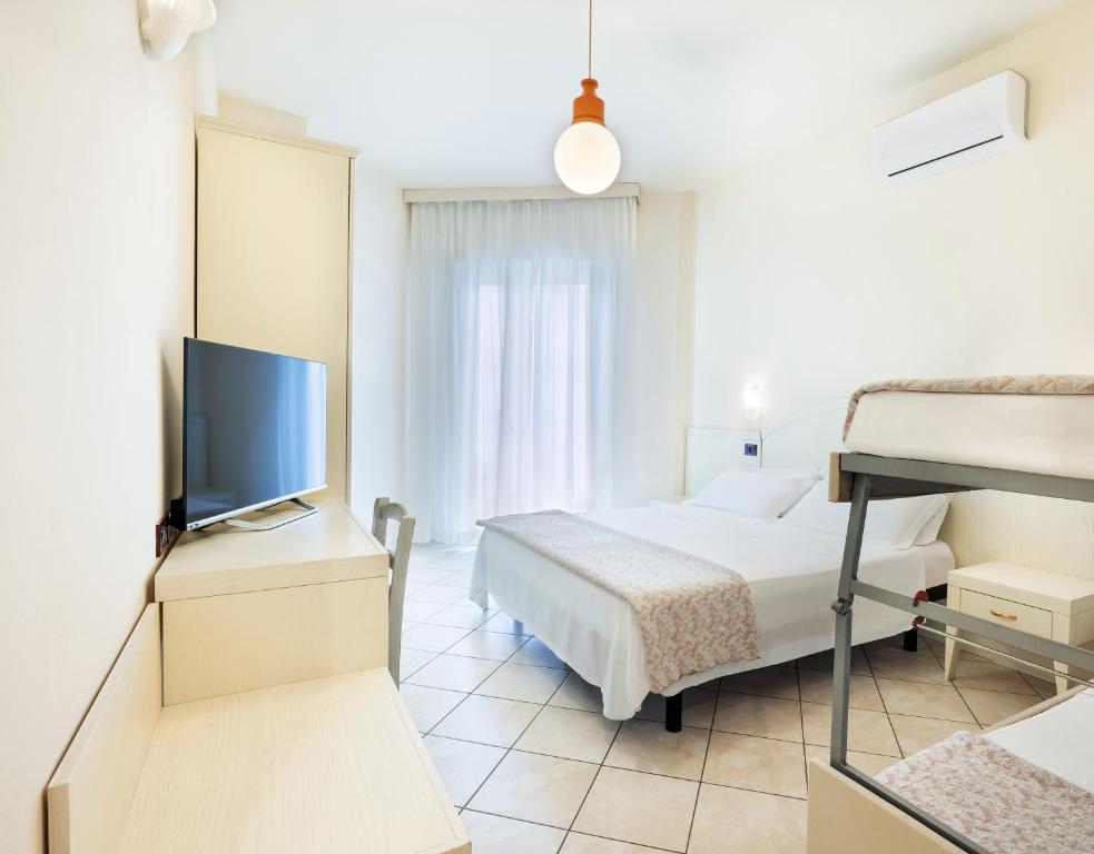 TV a/nebo společenská místnost v ubytování Hotel Fenice Gluten Free