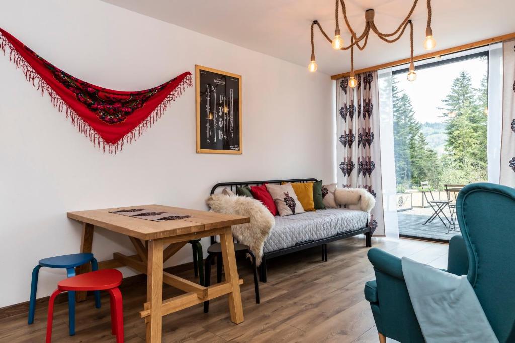 Posedenie v ubytovaní udanypobyt Apartamenty Krzeptówki Potok