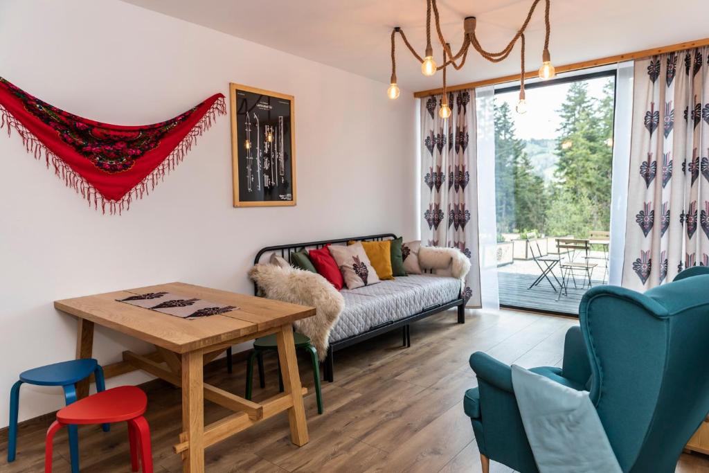 Posedenie v ubytovaní udanypobyt Apartamenty Krzeptówki Potok