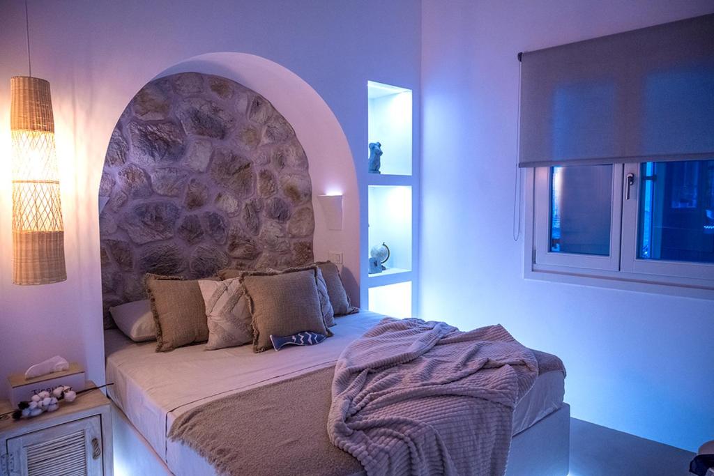 Voodi või voodid majutusasutuse NiaN CYCLADIC SUITE toas