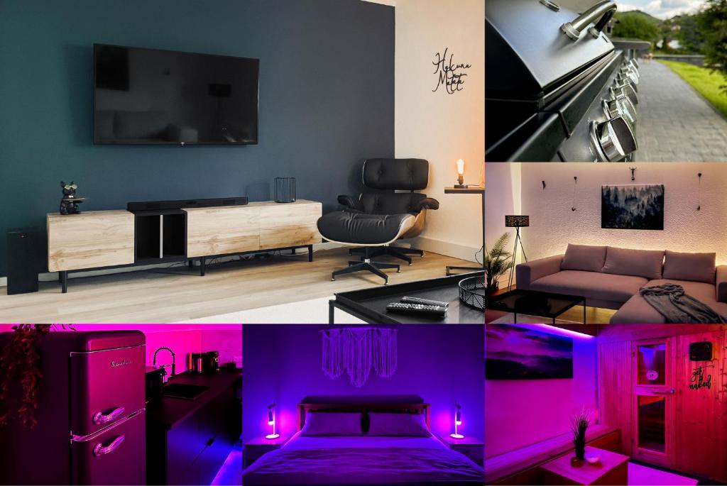sala de estar con muebles de color púrpura y TV en NOVA Romantic Luxus Relax Apartments mit Sauna, Nürburgring, Adenauer Forst, en Adenau