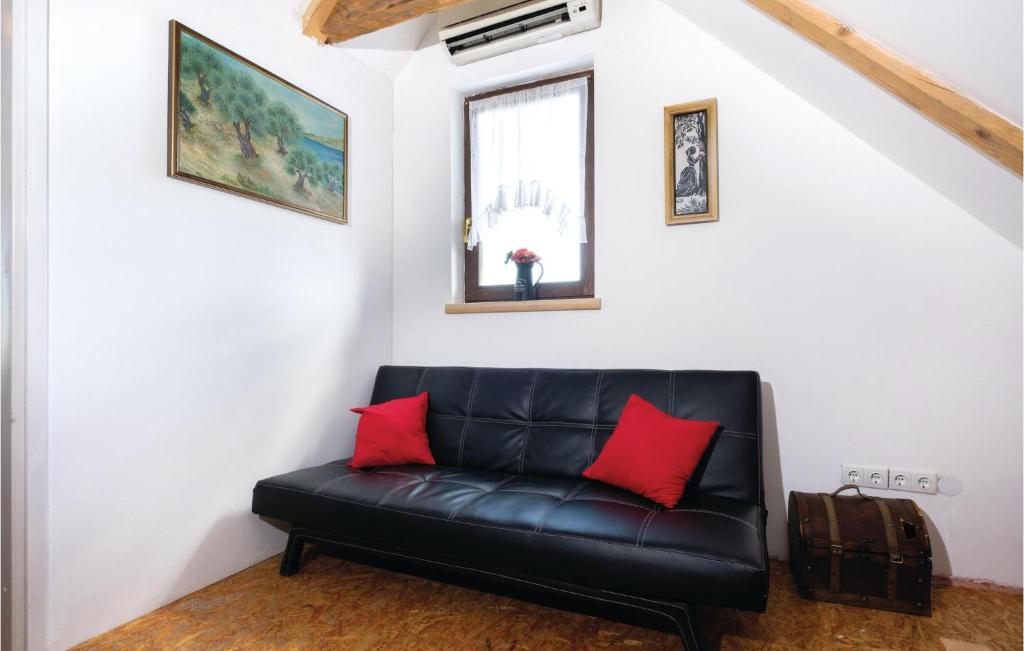 Posedenie v ubytovaní Two-Bedroom Holiday Home In Poljana