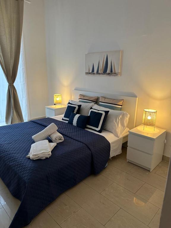 Posteľ alebo postele v izbe v ubytovaní B&B mazzocchi