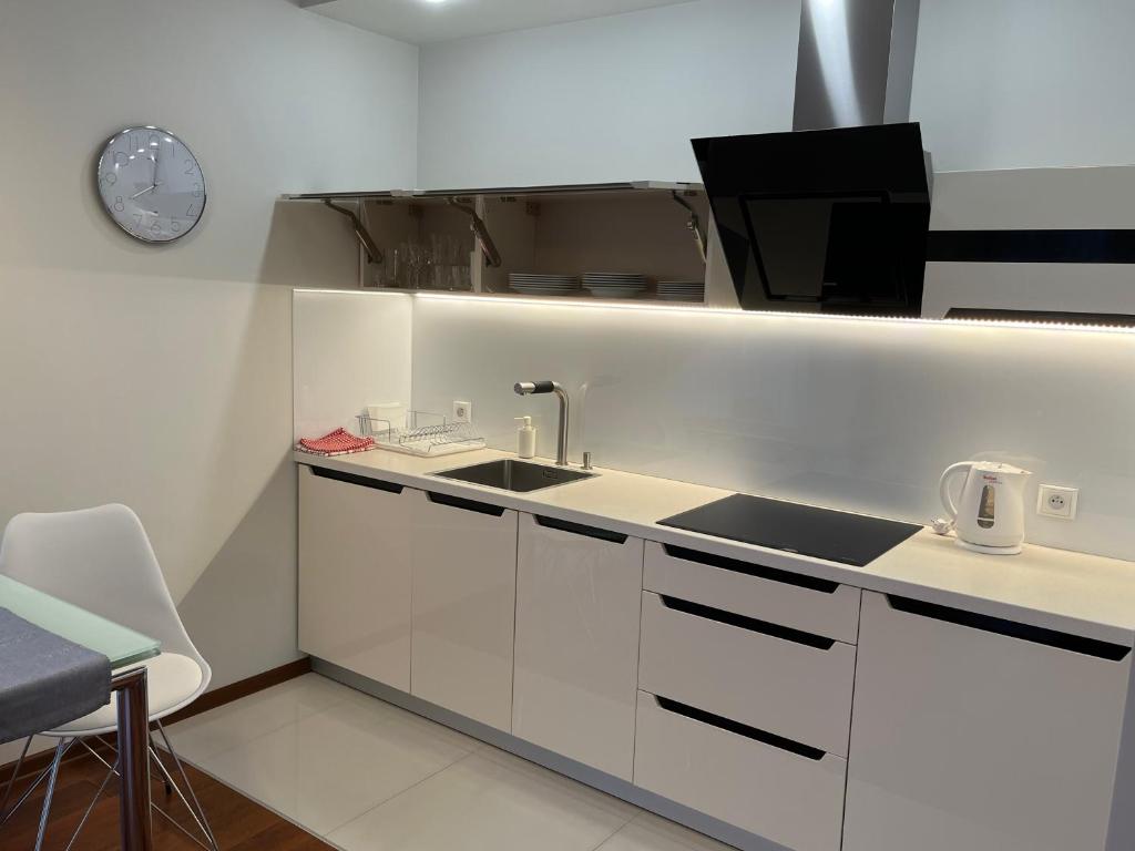 Kuchyňa alebo kuchynka v ubytovaní Apartament Esensja II