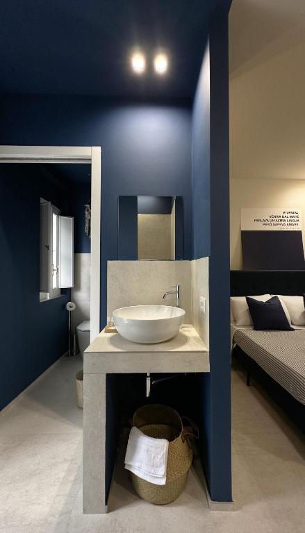 Postel nebo postele na pokoji v ubytování D'Aleammare - Rooms