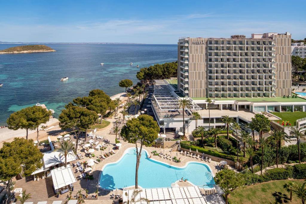 an aerial view of the hotel and the ocean at Meliá Calviá Beach in Magaluf