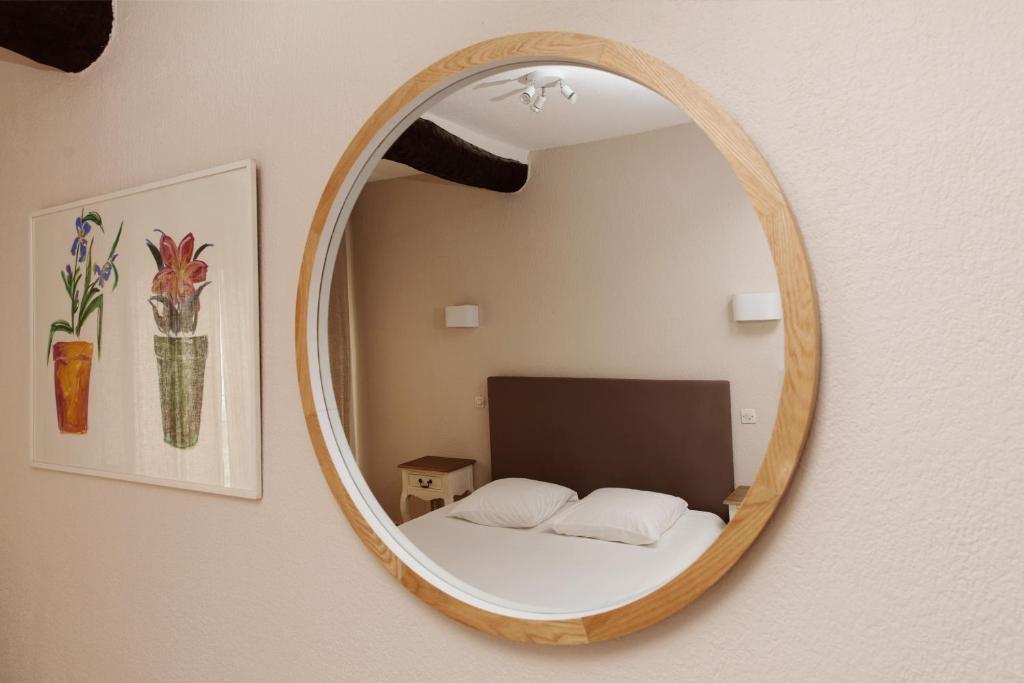 Postel nebo postele na pokoji v ubytování Coq Hotel