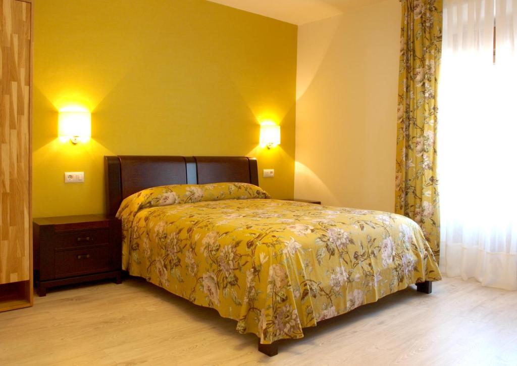Cama o camas de una habitación en Hosteria Sierra del Oso