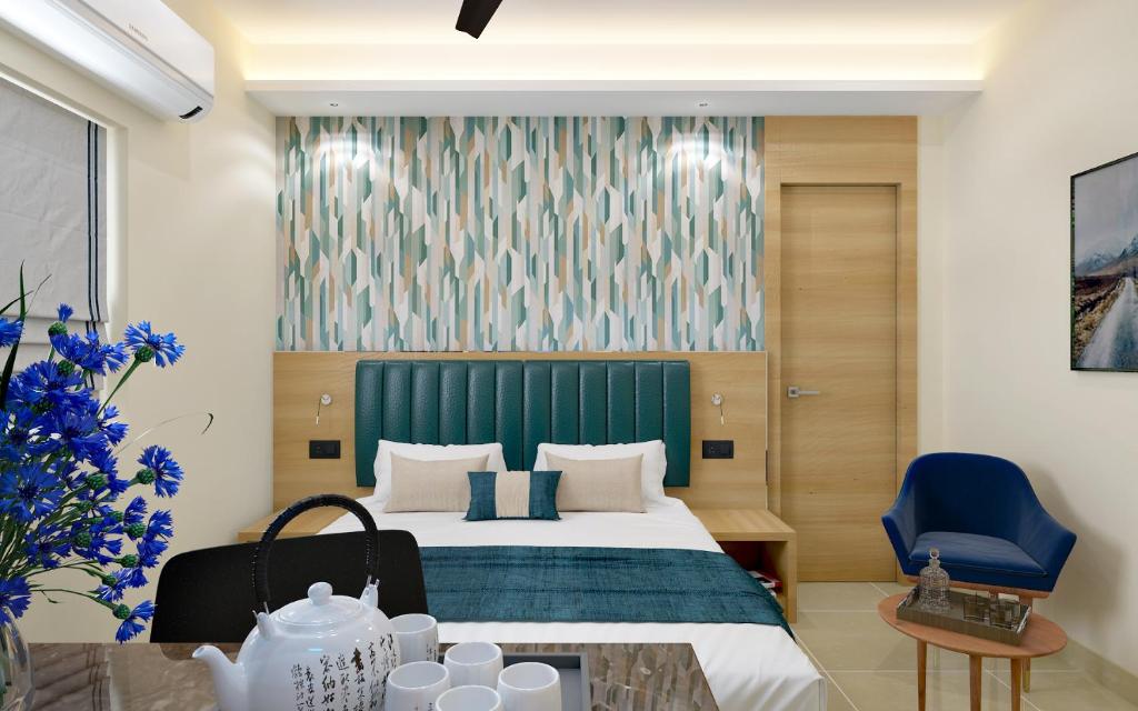 En eller flere senge i et værelse på Cozzet Victoria Hotel