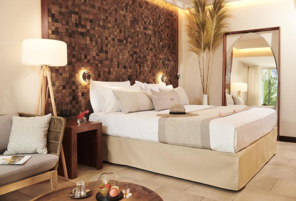 Postel nebo postele na pokoji v ubytování Palm Hotel & Spa