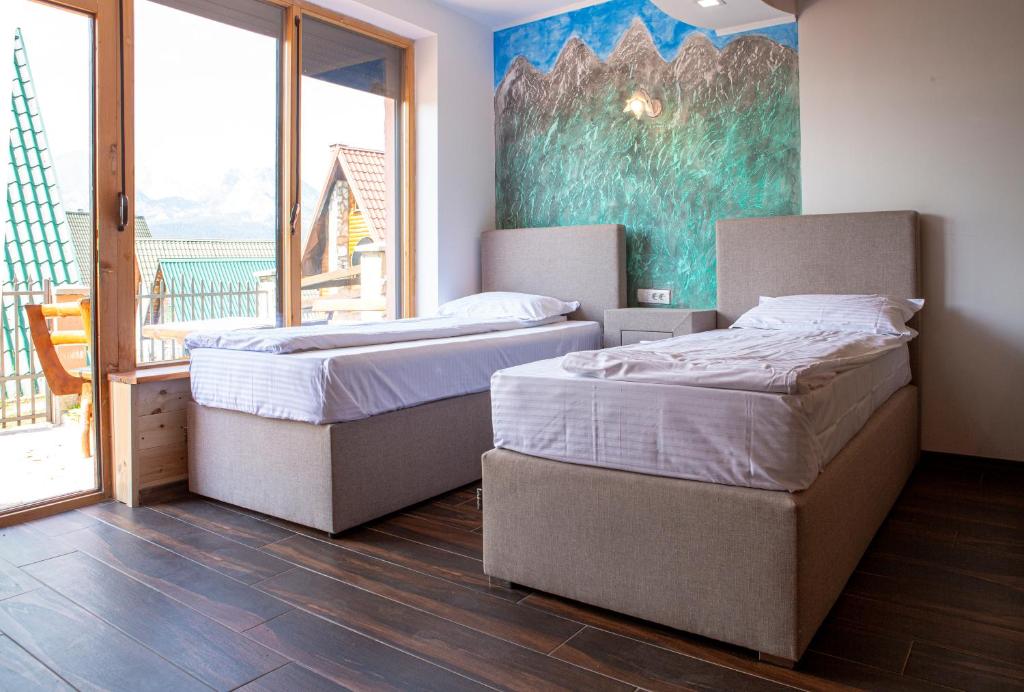 Postel nebo postele na pokoji v ubytování Monte Durmitor