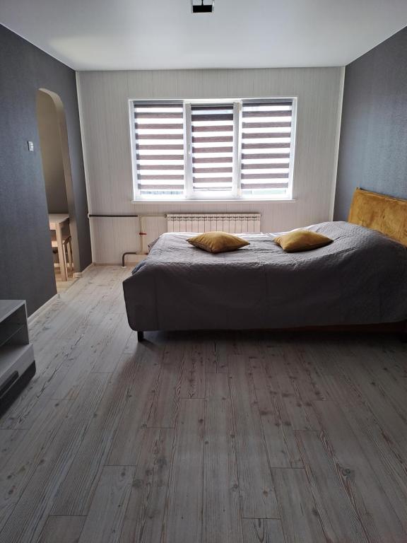 Postel nebo postele na pokoji v ubytování Rakvere studio