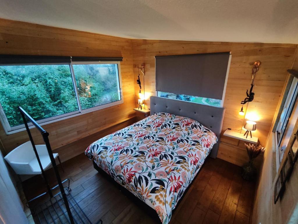 Postel nebo postele na pokoji v ubytování Gîte du Moulin de Tart le Bas