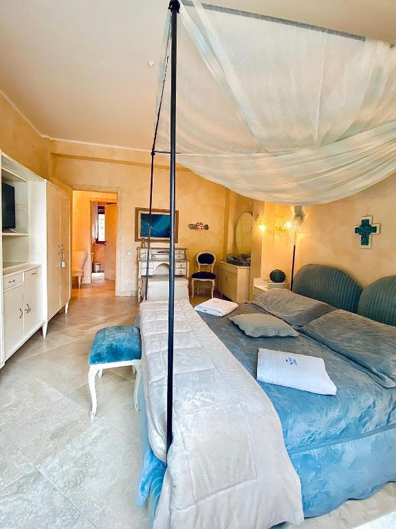 Postel nebo postele na pokoji v ubytování Le due palme Bed & Breakfast