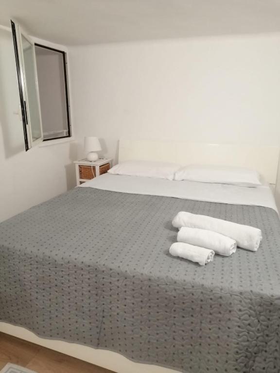 A bed or beds in a room at Yume House