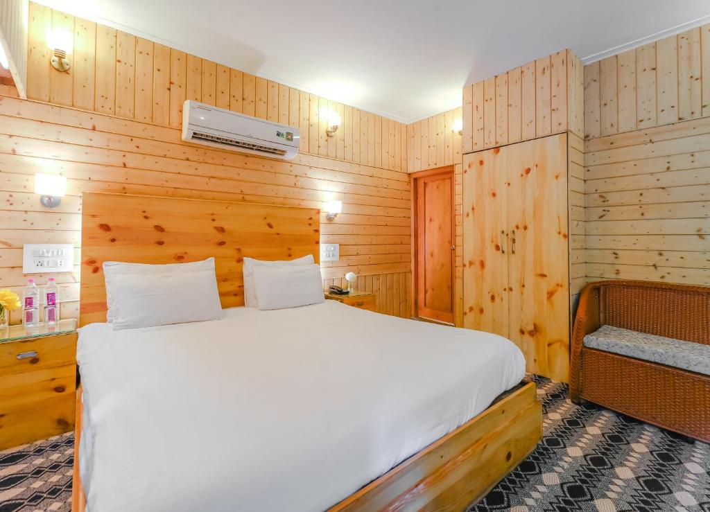 Postel nebo postele na pokoji v ubytování Hotel Mirage