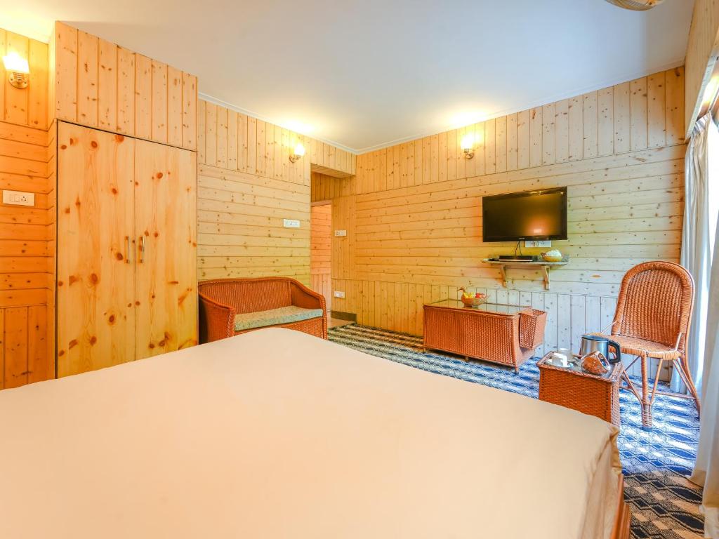 TV a/nebo společenská místnost v ubytování Hotel Mirage
