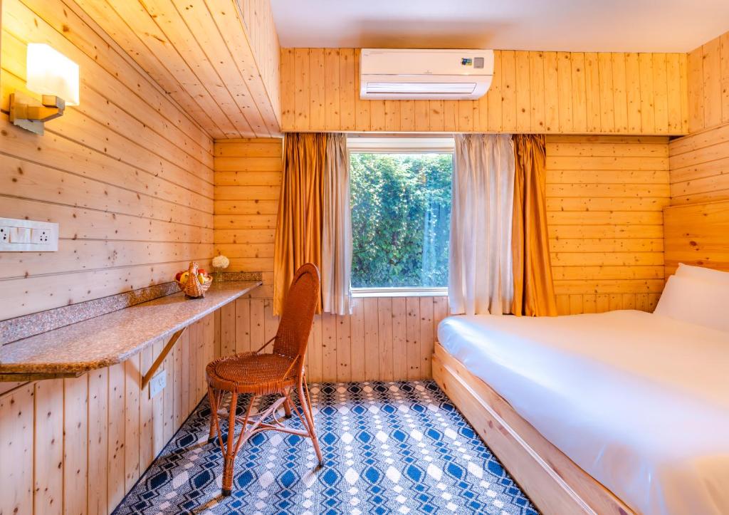 Postel nebo postele na pokoji v ubytování Hotel Mirage