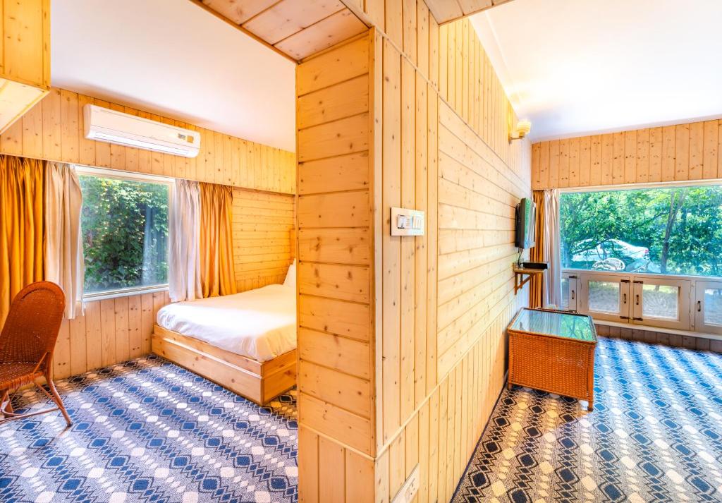 Postel nebo postele na pokoji v ubytování Hotel Mirage