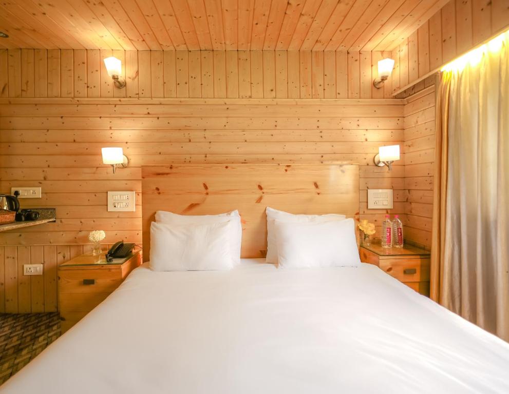 Postel nebo postele na pokoji v ubytování Hotel Mirage