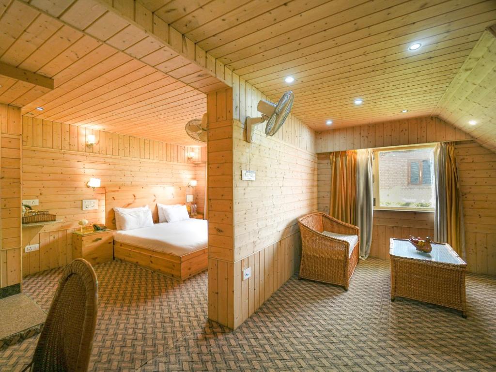 Postel nebo postele na pokoji v ubytování Hotel Mirage